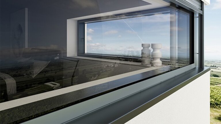 Fenstereckfront mit Einsicht ins Wohnzimmer. Außen mit eleganter Alufensterbank